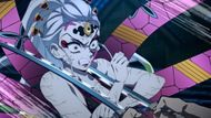Inosuke decapitating Daki (Image Credits: Ufotable)